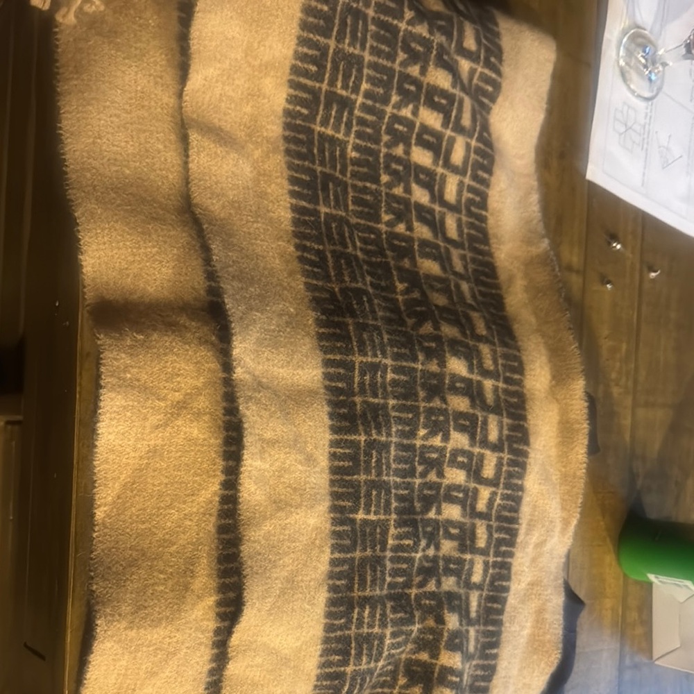 Tan and Black Patterned Blanket